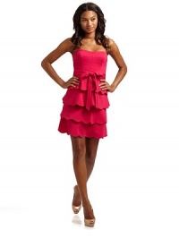 This stunning ponte frock with tiers of scallop ruffles at the skirt and a long sash at the waist, is an easy head-turner.Strapless neckline Seamed bodice with boning Belt loops with waist sash Side zipper Tiers of scalloped ruffles at waist Fully lined About 25 from shoulder to hem 69% rayon/26% nylon/5% spandex Dry clean Imported This stunning ponte frock with tiers of scallop ruffles at the skirt and a long sash at the waist, is an easy head-turner.Strapless neckline Seamed bodice with boning Belt loops with waist sash Side zipper Tiers of scalloped ruffles at waist Fully lined About 25 from shoulder to hem 69% rayon/26% nylon/5% spandex Dry clean Imported
