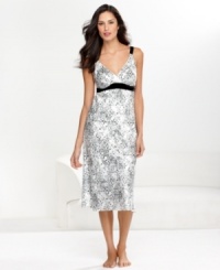 Velour trim under the bust of Morgan Taylor's printed gown gives this long style an interesting contrast and really complements the beautiful print. Velour trim under the bust of Morgan Taylor's printed gown gives this long style an interesting contrast and really complements the beautiful print.