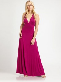 Feel like you're in paradise in this floor-length, shirred stretch jersey design. Plunging V necklineSleevelessShirred bustlineA-line silhouetteT backAbout 62 from shoulder to hem92% modal/8% spandexDry cleanMade in USAModel shown is 5'9 (176cm) wearing US size Small. Feel like you're in paradise in this floor-length, shirred stretch jersey design. Plunging V necklineSleevelessShirred bustlineA-line silhouetteT backAbout 62 from shoulder to hem92% modal/8% spandexDry cleanMade in USAModel shown is 5'9 (176cm) wearing US size Small.
