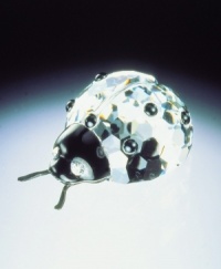 What a wonderful way to liven up a dreary desk! This Swarovski crystal ladybug will lend its charming, faceted shine to everyday decor. This fun symbol of good luck is made in the fine tradition of elegant Swarovski crystal. Measures 1 1/2. What a wonderful way to liven up a dreary desk! This Swarovski crystal ladybug will lend its charming, faceted shine to everyday decor. This fun symbol of good luck is made in the fine tradition of elegant Swarovski crystal. Measures 1 1/2.