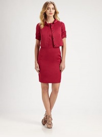 Ruched sleeves and a slim foldover collar give this cropped piece a chic, sculptural air.Foldover stand collarShort ruched sleevesButton frontBust dartsFully linedAbout 15 from shoulder to hemPolyesterDry cleanImportedModel shown is 5'11 (180cm) wearing US size 2. Ruched sleeves and a slim foldover collar give this cropped piece a chic, sculptural air.Foldover stand collarShort ruched sleevesButton frontBust dartsFully linedAbout 15 from shoulder to hemPolyesterDry cleanImportedModel shown is 5'11 (180cm) wearing US size 2.