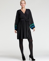 Crisp color blocking punctuates the oversized sleeves of a flowing Taylor Dresses Plus wrap dress for a retro style statement. Layer over black tights for a glamorous take on groovy. Crisp color blocking punctuates the oversized sleeves of a flowing Taylor Dresses Plus wrap dress for a retro style statement. Layer over black tights for a glamorous take on groovy.