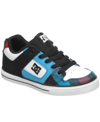 Plaid accents on the toes of these Pure sneakers from DC Shoes gives his skate style a classic edge. Plaid accents on the toes of these Pure sneakers from DC Shoes gives his skate style a classic edge.