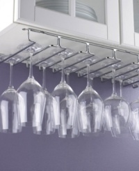Show off stemware and de-clutter your kitchen with this metal stemware rack from Wine Enthusiast. Designed to hang under cabinets and shelving systems for maximum space saving, this sleek chrome design balances functionality and style. Show off stemware and de-clutter your kitchen with this metal stemware rack from Wine Enthusiast. Designed to hang under cabinets and shelving systems for maximum space saving, this sleek chrome design balances functionality and style.