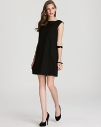 A wardrobe essential, this kate spade new york dress flaunts a streamlined, minimalist silhouette for an always-appropriate style. A wardrobe essential, this kate spade new york dress flaunts a streamlined, minimalist silhouette for an always-appropriate style.
