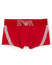 Emporio Armani updates the classic cotton trunk with a wide, low-rise logo waistband and stripe details at the hip. Emporio Armani updates the classic cotton trunk with a wide, low-rise logo waistband and stripe details at the hip.