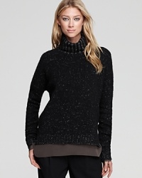 This tweedy knit Vince sweater, constructed from a speckled blend of wool and cashmere, is the cozy-chic must-have to revitalize fall wardrobe. This tweedy knit Vince sweater, constructed from a speckled blend of wool and cashmere, is the cozy-chic must-have to revitalize fall wardrobe.