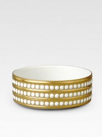 A beautiful serving bowl in fine Limoges porcelain, made entirely by hand and finished with individually-applied 14k gold pearl detail. From the Perlee Gold Collection Porcelain 1¾ X 5 diam. Dishwasher safe Imported A beautiful serving bowl in fine Limoges porcelain, made entirely by hand and finished with individually-applied 14k gold pearl detail. From the Perlee Gold Collection Porcelain 1¾ X 5 diam. Dishwasher safe Imported