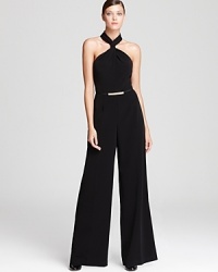 Jumpsuits are making a comeback in a big way this fall--the effortless one-piece construction makes this glamorous Trina Turk jumpsuit a modern wardrobe must-own. Jumpsuits are making a comeback in a big way this fall--the effortless one-piece construction makes this glamorous Trina Turk jumpsuit a modern wardrobe must-own.