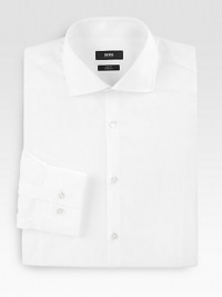 A crisp, slim-fitting classic tailored in fine cotton. ButtonfrontSpread collarCottonDry cleanImported