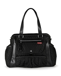 The Studio diaper tote is stylish enough to pair with a little black dress, but practical enough to keep you and baby stocked for a long day on the playground. The Studio diaper tote is stylish enough to pair with a little black dress, but practical enough to keep you and baby stocked for a long day on the playground.