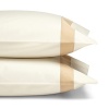 A classic sateen border trims these pillowcases by SFERRA, woven from super soft Egyptian cotton.