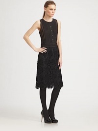 An intricate shirt-tailored bodice, embellished with a scalloped macrame skirt.Jewel necklineSleevelessButton frontPleated bibMacrame skirtBack zipAbout 26 from natural waistCottonDry cleanImportedModel shown is 5'9½ (176cm) wearing US size 4. An intricate shirt-tailored bodice, embellished with a scalloped macrame skirt.Jewel necklineSleevelessButton frontPleated bibMacrame skirtBack zipAbout 26 from natural waistCottonDry cleanImportedModel shown is 5'9½ (176cm) wearing US size 4.
