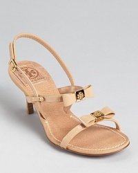 Ladylike bows add a delicate touch to the Tory Burch Kailey sandals, offering a dressed up look that's comfortable with a 2.5 heel. Ladylike bows add a delicate touch to the Tory Burch Kailey sandals, offering a dressed up look that's comfortable with a 2.5 heel.
