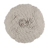 A classic rose reinterpreted for modern living in a swirl of putty-colored felt petals on a round pillow. Reverses to solid felt of the same color.