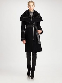 A jacket that offers a brilliant combination of buttery leather and luxurious toscana sheep fur. Its asymmetrical zipper adds to this style's sartorial mystique.Asymmetrical front zipperLambskin leather and fur detailsSlash pocketsSelf-tie beltFully linedAbout 40 from shoulder to hem70% wool/20% polyamide/10% cashmereDry clean by fur and leather specialistImported of Italian fabricFur origin: Turkey Model shown is 5'10 (177cm) wearing US size Small. A jacket that offers a brilliant combination of buttery leather and luxurious toscana sheep fur. Its asymmetrical zipper adds to this style's sartorial mystique.Asymmetrical front zipperLambskin leather and fur detailsSlash pocketsSelf-tie beltFully linedAbout 40 from shoulder to hem70% wool/20% polyamide/10% cashmereDry clean by fur and leather specialistImported of Italian fabricFur origin: Turkey Model shown is 5'10 (177cm) wearing US size Small.