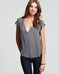 This simple silk top from Joie is a versatile piece you can wear all year long. Dress it down with denim cutoffs in the summer or pair it with your favorite skinny jeans in the fall. This simple silk top from Joie is a versatile piece you can wear all year long. Dress it down with denim cutoffs in the summer or pair it with your favorite skinny jeans in the fall.