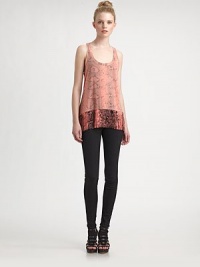 Bold snake-print on supple matte silk, trimmed with fringe at the hem for a contemporary edge.ScoopneckSleevelessSatin frontModified racerbackAbout 27 from shoulder to hemSilkDry cleanImportedModel shown is 5'10 (177cm) wearing US size Small. Bold snake-print on supple matte silk, trimmed with fringe at the hem for a contemporary edge.ScoopneckSleevelessSatin frontModified racerbackAbout 27 from shoulder to hemSilkDry cleanImportedModel shown is 5'10 (177cm) wearing US size Small.
