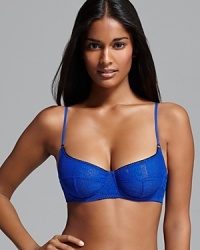 Wear any top you dare with Free People's plunging lace bra, a stunning undergarment for revealing silhouettes. Style #F515O690A. Wear any top you dare with Free People's plunging lace bra, a stunning undergarment for revealing silhouettes. Style #F515O690A.