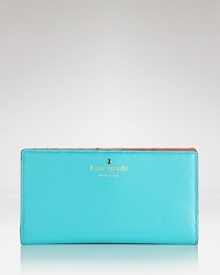Here's a cute idea: carry all of your nearest-and-dearest essentials in this kate spade new york leather wallet, which features 12 credit card slots. Here's a cute idea: carry all of your nearest-and-dearest essentials in this kate spade new york leather wallet, which features 12 credit card slots.