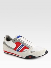 Make a bold statement in this eye-catching casual style of premium leather and suede with signature logo detail.Leather upperPadded insoleRubber soleImported Make a bold statement in this eye-catching casual style of premium leather and suede with signature logo detail.Leather upperPadded insoleRubber soleImported