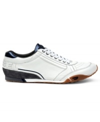A cool leather strap adds stealthy, sporty style to these smart Diesel men's sneakers. A cool leather strap adds stealthy, sporty style to these smart Diesel men's sneakers.