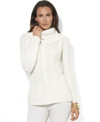 Lauren Ralph Lauren's soft cable-knit sweater is knit from a plush blend of wool, angora and cashmere yarns and finished with elegant buttons at the cowl neckline.