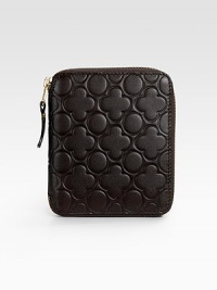 Chic, zip around design in supple leather has a clover-embossed exterior and a smooth surface interior. Zipper closure Snap coin purse Four credit card slots Leather lining 5W X 4H X 1D Made in Spain Chic, zip around design in supple leather has a clover-embossed exterior and a smooth surface interior. Zipper closure Snap coin purse Four credit card slots Leather lining 5W X 4H X 1D Made in Spain
