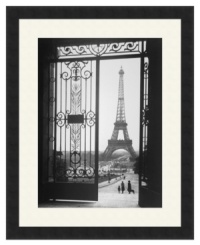 The defining symbol of the City of Lights, the soaring Eiffel Tower is the focal point of this elegant black-and-white print, taken from the famous Trocadero Esplanade in Paris. A satin black frame creates a sleek modern finish. The defining symbol of the City of Lights, the soaring Eiffel Tower is the focal point of this elegant black-and-white print, taken from the famous Trocadero Esplanade in Paris. A satin black frame creates a sleek modern finish.
