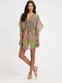 A breezy design with a stunningly vivid print and a glamorous, embellished detail at its flattering, gathered bodice. V-necklineFlutter sleevesEmbellished detail at gathered centerRuffle hemPull-on style80% polyamide/20% elastaneHand washImported A breezy design with a stunningly vivid print and a glamorous, embellished detail at its flattering, gathered bodice. V-necklineFlutter sleevesEmbellished detail at gathered centerRuffle hemPull-on style80% polyamide/20% elastaneHand washImported