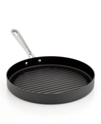 A supporting piece for a master chef. Inspired by the passion & precision of Emeril, this hard-anodized grill pan boasts an easy-release nonstick finish that expertly heats and preps your favorite dishes. Add the lid for moisture-rich, nutrient-loaded meals. Lifetime warranty. A supporting piece for a master chef. Inspired by the passion & precision of Emeril, this hard-anodized grill pan boasts an easy-release nonstick finish that expertly heats and preps your favorite dishes. Add the lid for moisture-rich, nutrient-loaded meals. Lifetime warranty.
