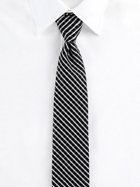 A sartorial standard for the modern man, woven with a delicate check pattern in smooth cotton.CottonDry cleanMade in Italy A sartorial standard for the modern man, woven with a delicate check pattern in smooth cotton.CottonDry cleanMade in Italy