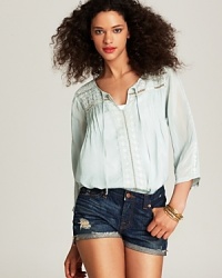 Perfect the pretty peasant look in this delicately detailed semi-sheer Johnny Was Collection tunic. Perfect the pretty peasant look in this delicately detailed semi-sheer Johnny Was Collection tunic.