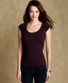 Tommy Hilfiger's top features ruffled cap sleeves for a feminine touch. Pair it with skinny jeans to complete the look.