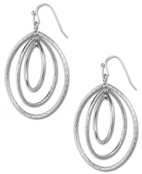 With an eye-catching design, these triple-oval earrings from Anne Klein can take center stage or complement a look. Crafted in imitation rhodium-plated mixed metal. Approximate drop: 2 inches. With an eye-catching design, these triple-oval earrings from Anne Klein can take center stage or complement a look. Crafted in imitation rhodium-plated mixed metal. Approximate drop: 2 inches.