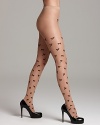 Feel elegantly sexy with these nude tights featuring a black ribbon pattern from Wolford.