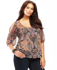 Delicate beading adds a touch of shine to INC's cutout-shoulder plus size top. The intricate paisley print gives this look a touch of exotic glamour. Delicate beading adds a touch of shine to INC's cutout-shoulder plus size top. The intricate paisley print gives this look a touch of exotic glamour.