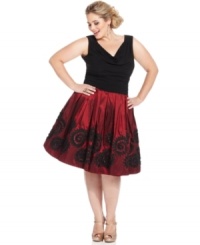 SL Fashions crafts a plus size party dress featuring a flattering ruched waistline and a full, applique-embellished skirt. SL Fashions crafts a plus size party dress featuring a flattering ruched waistline and a full, applique-embellished skirt.