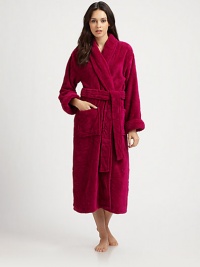 Wrap her in the incomparable luxury of this cozy, plush robe, sculpted with a subtle abstract floral motif.Shawl collarClassic wrap stylingSelf sashPatch pocketsLong sleevesAbout 48 longPolyesterMachine washImported Wrap her in the incomparable luxury of this cozy, plush robe, sculpted with a subtle abstract floral motif.Shawl collarClassic wrap stylingSelf sashPatch pocketsLong sleevesAbout 48 longPolyesterMachine washImported