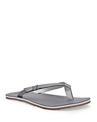 A flip flop sandal gets a luxe overhaul, crafted in lightly metallic leather. From UGG® Australia. A flip flop sandal gets a luxe overhaul, crafted in lightly metallic leather. From UGG® Australia.