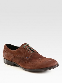 Contrasting laces brings a fresh attitude to a classic broque style, constructed in a smooth suede finish with perforated detail, ideal for pairing up with your favorite tailored trousers.Suede upperLeather liningRubber soleMade in Italy Contrasting laces brings a fresh attitude to a classic broque style, constructed in a smooth suede finish with perforated detail, ideal for pairing up with your favorite tailored trousers.Suede upperLeather liningRubber soleMade in Italy