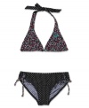 Make her style stand out in this reverse halter top two-piece set from Roxy.