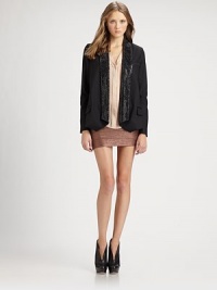 Timeless, well-tailored blazer, enhanced by a sparkling rhinestone-embellished collar. Rhinestone-embellished shawl collarLong sleeves with buttoned cuffsSingle chest pocketFront flap pocketsBack ventAbout 26 from shoulder to hem96% wool/4% elastaneDry cleanMade in USAModel shown is 5'10 (177cm) wearing US size 4. Timeless, well-tailored blazer, enhanced by a sparkling rhinestone-embellished collar. Rhinestone-embellished shawl collarLong sleeves with buttoned cuffsSingle chest pocketFront flap pocketsBack ventAbout 26 from shoulder to hem96% wool/4% elastaneDry cleanMade in USAModel shown is 5'10 (177cm) wearing US size 4.