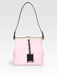 This elegant leather style features a sleek colorblocked design with a detachable logo tag.Shoulder strap, 10 dropTop clasp closure8W X 8H X 3¾DMade in Italy This elegant leather style features a sleek colorblocked design with a detachable logo tag.Shoulder strap, 10 dropTop clasp closure8W X 8H X 3¾DMade in Italy