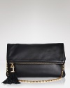 Designed with the front row in mind, this Michael Kors clutch works an in-demand silhouette, styled in ultra sumptuous leather. It's a runaway runway favorite.