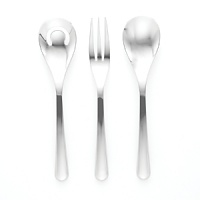 Aura five-piece place setting by Nambé. Made of forged 18/10 stainless steel and polished to a mirror finish, these pieces are exceptionally lustrous, durable and rust resistant. Setting consists of dinner fork, salad fork, knife, teaspoon, and tablespoon.
