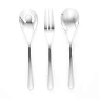 Aura five-piece place setting by Nambé. Made of forged 18/10 stainless steel and polished to a mirror finish, these pieces are exceptionally lustrous, durable and rust resistant. Setting consists of dinner fork, salad fork, knife, teaspoon, and tablespoon. Aura five-piece place setting by Nambé. Made of forged 18/10 stainless steel and polished to a mirror finish, these pieces are exceptionally lustrous, durable and rust resistant. Setting consists of dinner fork, salad fork, knife, teaspoon, and tablespoon.