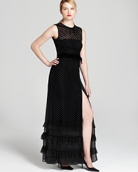 Making a stunning style statement in this Nanette Lepore gown boasting retro polka dots on a flowing, ruffled silhouette. Making a stunning style statement in this Nanette Lepore gown boasting retro polka dots on a flowing, ruffled silhouette.
