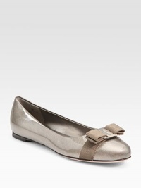 Slightly ribbed bow adorns the front of this sleek patent leather design. Patent leather upper Leather lining and sole Padded insole Made in ItalyOUR FIT MODEL RECOMMENDS ordering one half size up as this style runs small. Slightly ribbed bow adorns the front of this sleek patent leather design. Patent leather upper Leather lining and sole Padded insole Made in ItalyOUR FIT MODEL RECOMMENDS ordering one half size up as this style runs small.