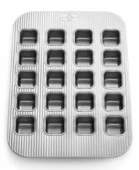 Proud to be American made! The commercial-grade heavy-gauge aluminized steel brownie pan features 20 wells for making bite-sized desserts your family will love. A unique fluted surface promotes even air circulation while baking, so your sweet treats are always perfectly delicious, and the nonstick, environmentally-friendly silicone finish is safe, natural and simply the best for baking. Lifetime warranty. Proud to be American made! The commercial-grade heavy-gauge aluminized steel brownie pan features 20 wells for making bite-sized desserts your family will love. A unique fluted surface promotes even air circulation while baking, so your sweet treats are always perfectly delicious, and the nonstick, environmentally-friendly silicone finish is safe, natural and simply the best for baking. Lifetime warranty.